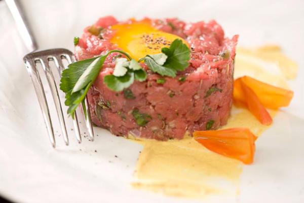 Gluten-free veal tartare with eggs, capers and lime
