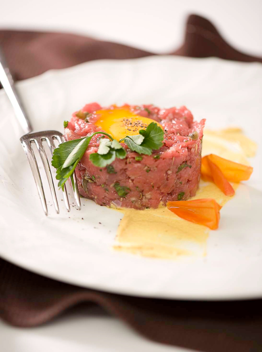 Gluten-free veal tartare with eggs, capers and lime