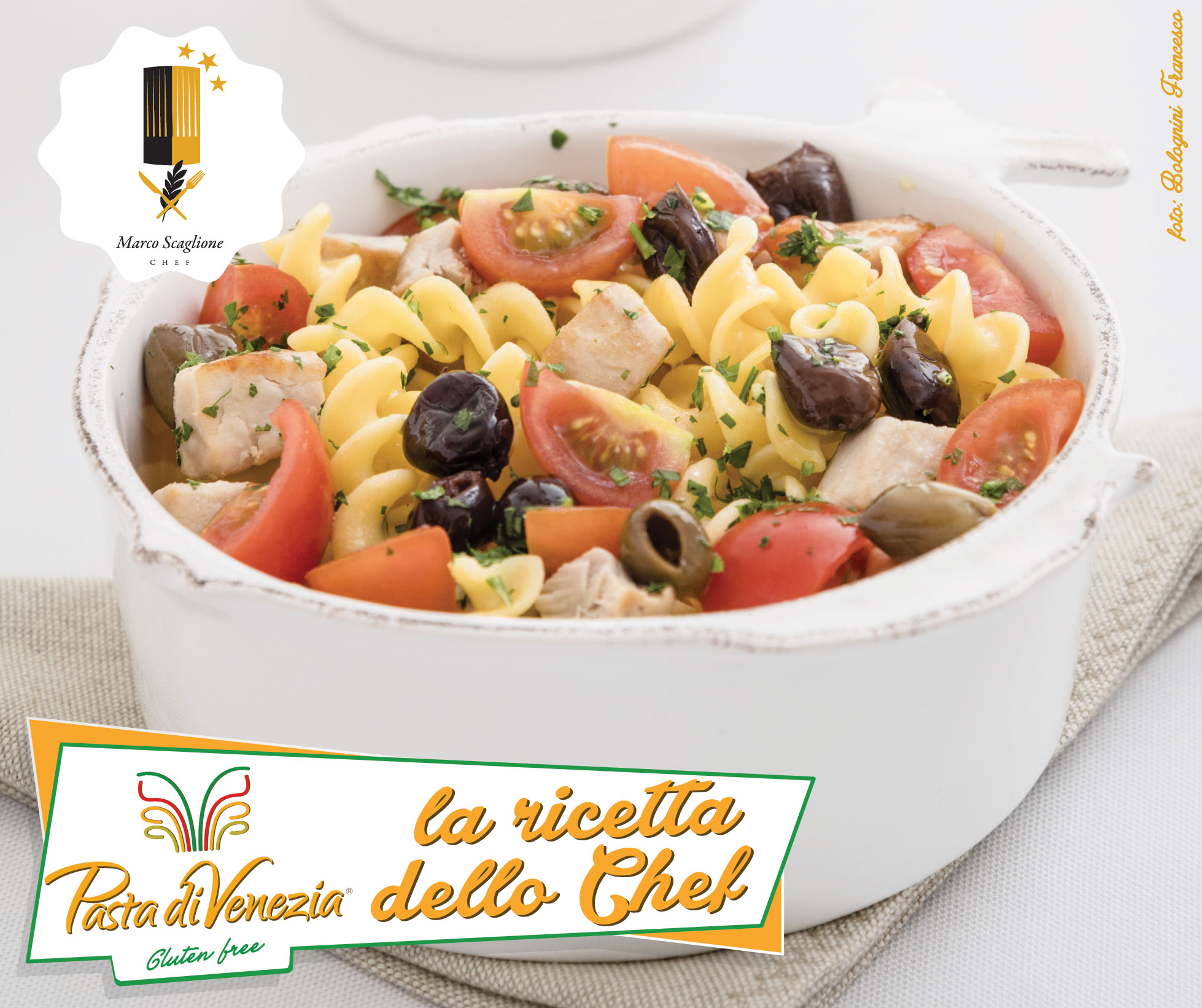 Gluten-free corn fusilli with tuna cubes, cherry tomatoes and taggiasca olives