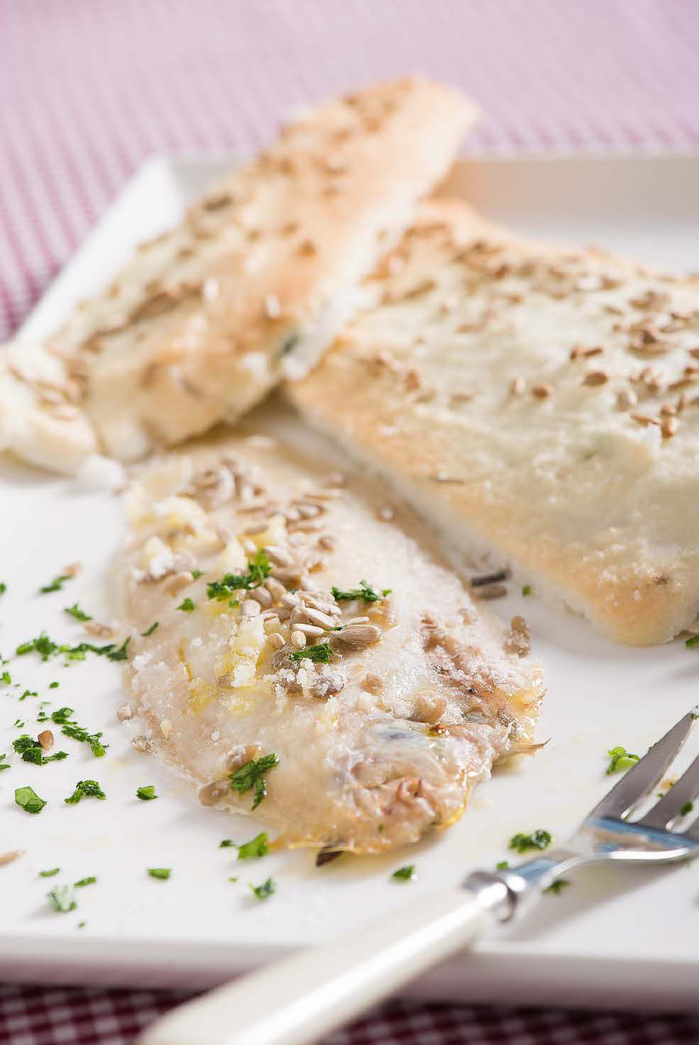 Gluten-free sole in salt crust and sunflower seeds