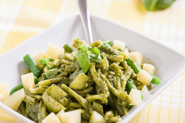 Gluten-free corn twins made with Genovese pesto