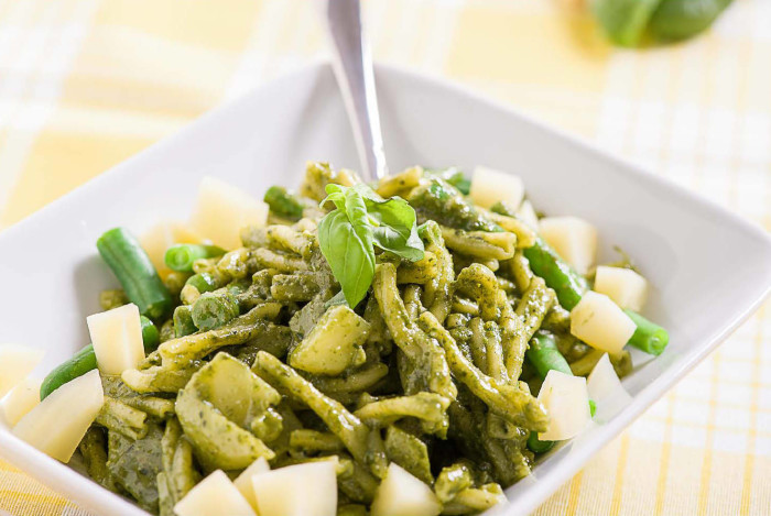 Gluten-free corn twins made with Genovese pesto