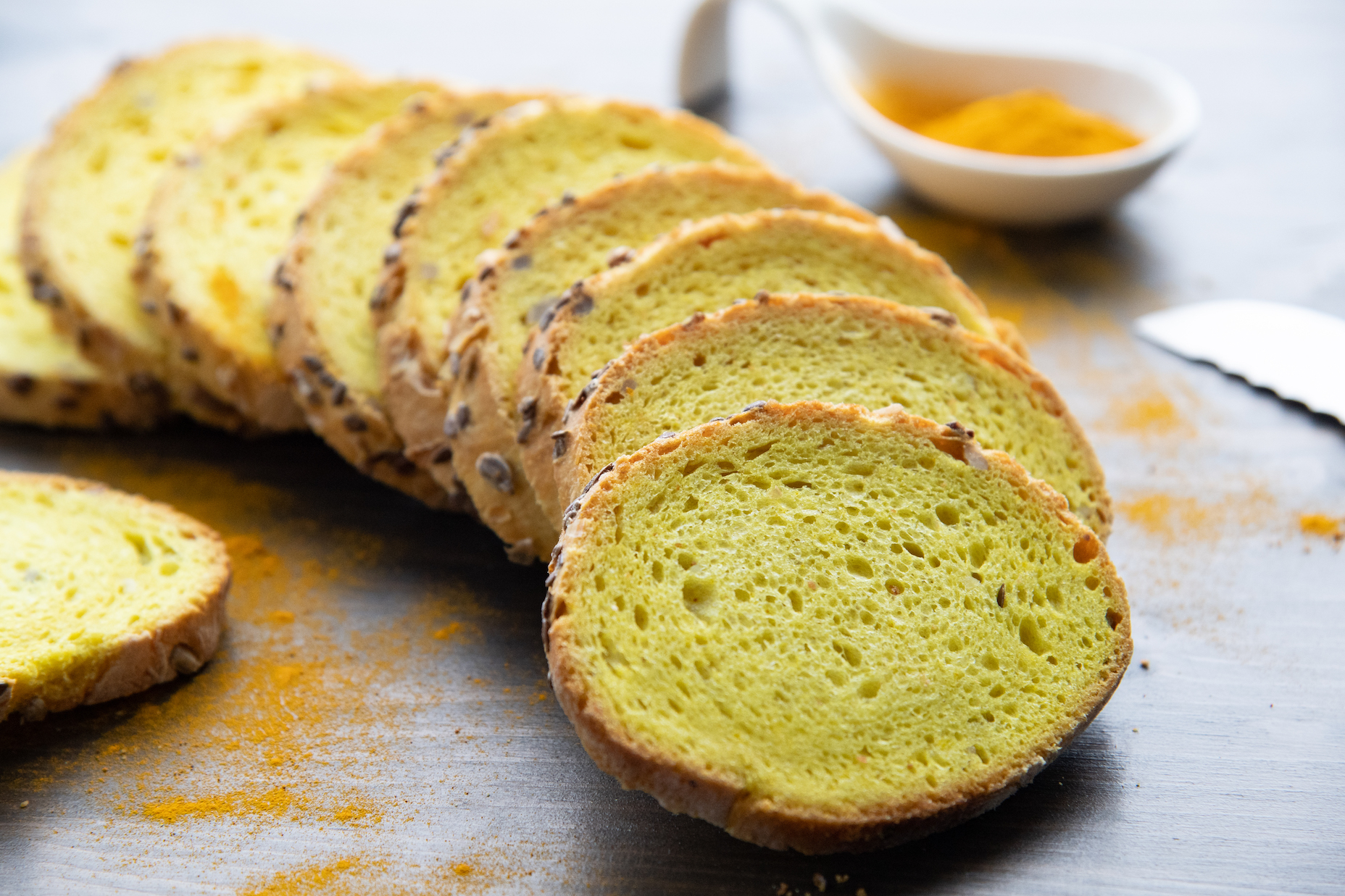 A loaf of turmeric bread with gluten-free bean flour