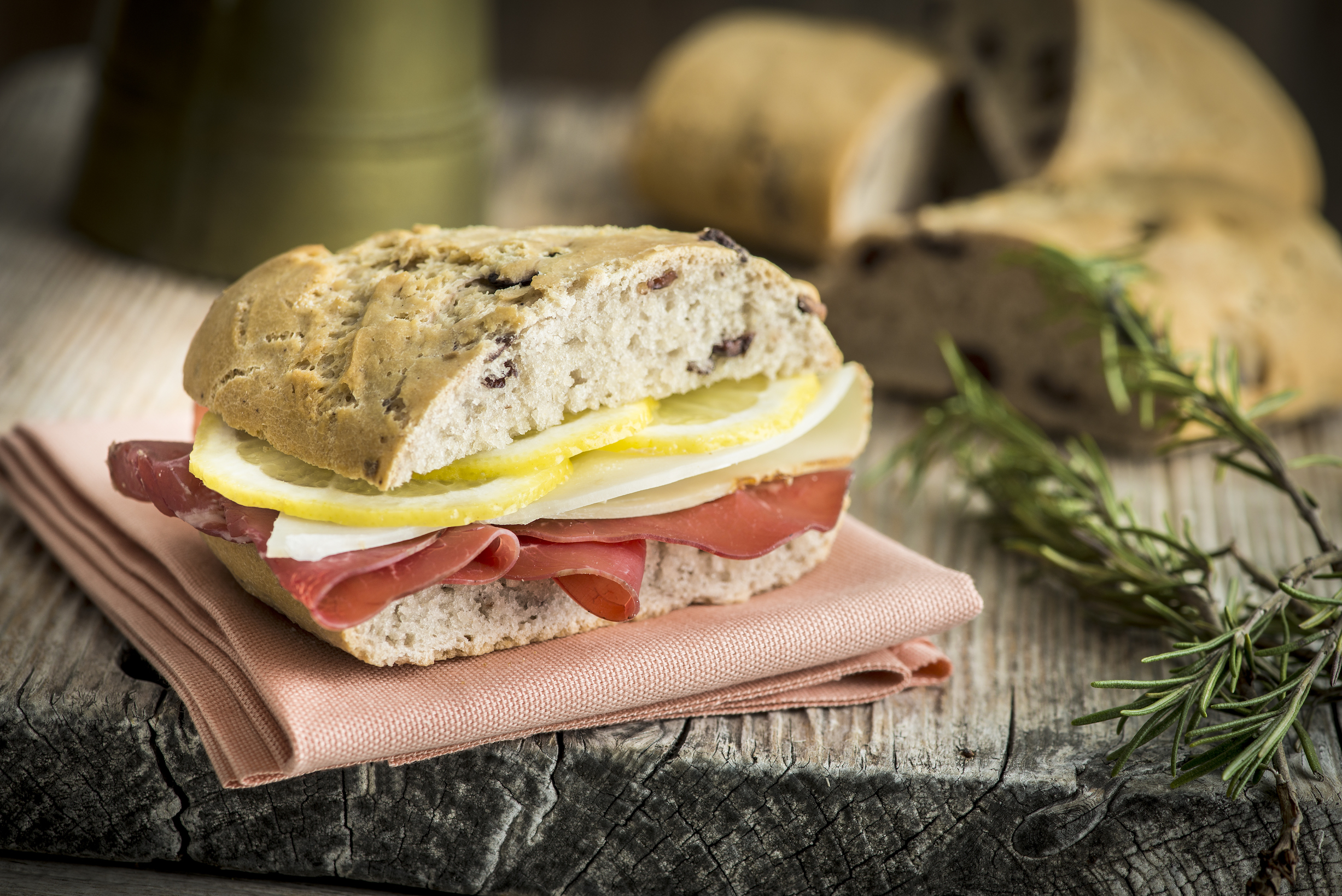 Gluten-free buckwheat ciabatta with bresaola, caciocavallo and lemon