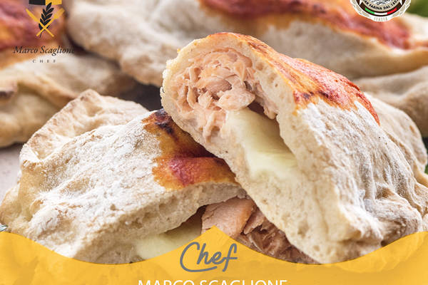 Gluten-free baked calzone with tuna fillets and provola cheese