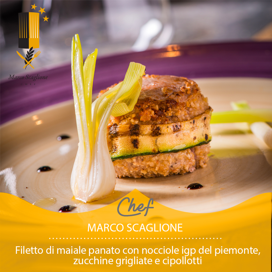 Filetto di maiale panato con nocciole igp del piemonte, zucchine grigliate e cipollotto scottato