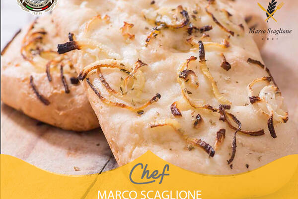 Soft focaccia with onion and parmesan