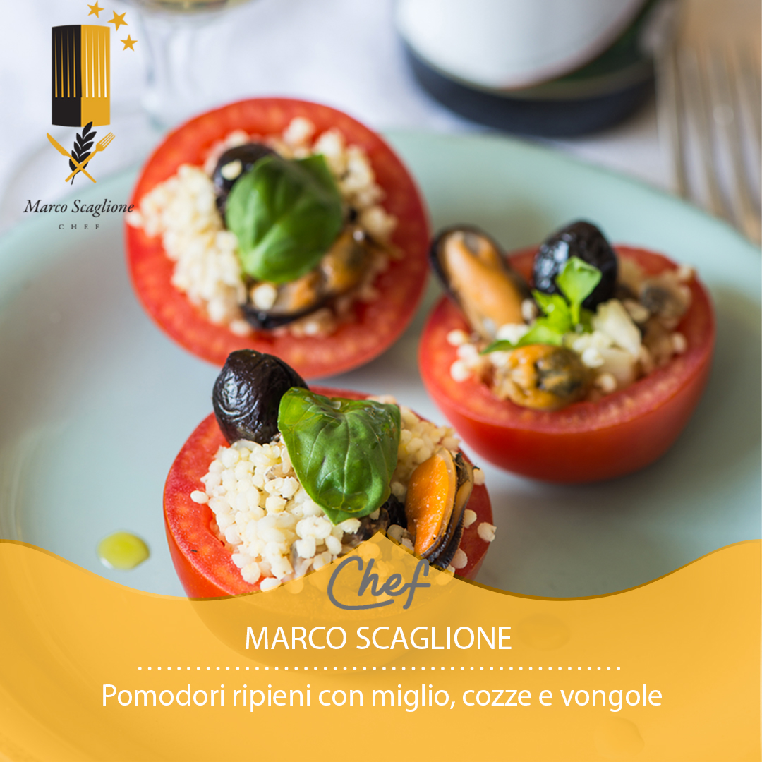 Stuffed tomatoes with millet, mussels and clams